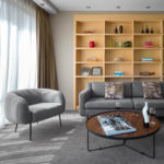 image of a lounge featuring a bookshelf